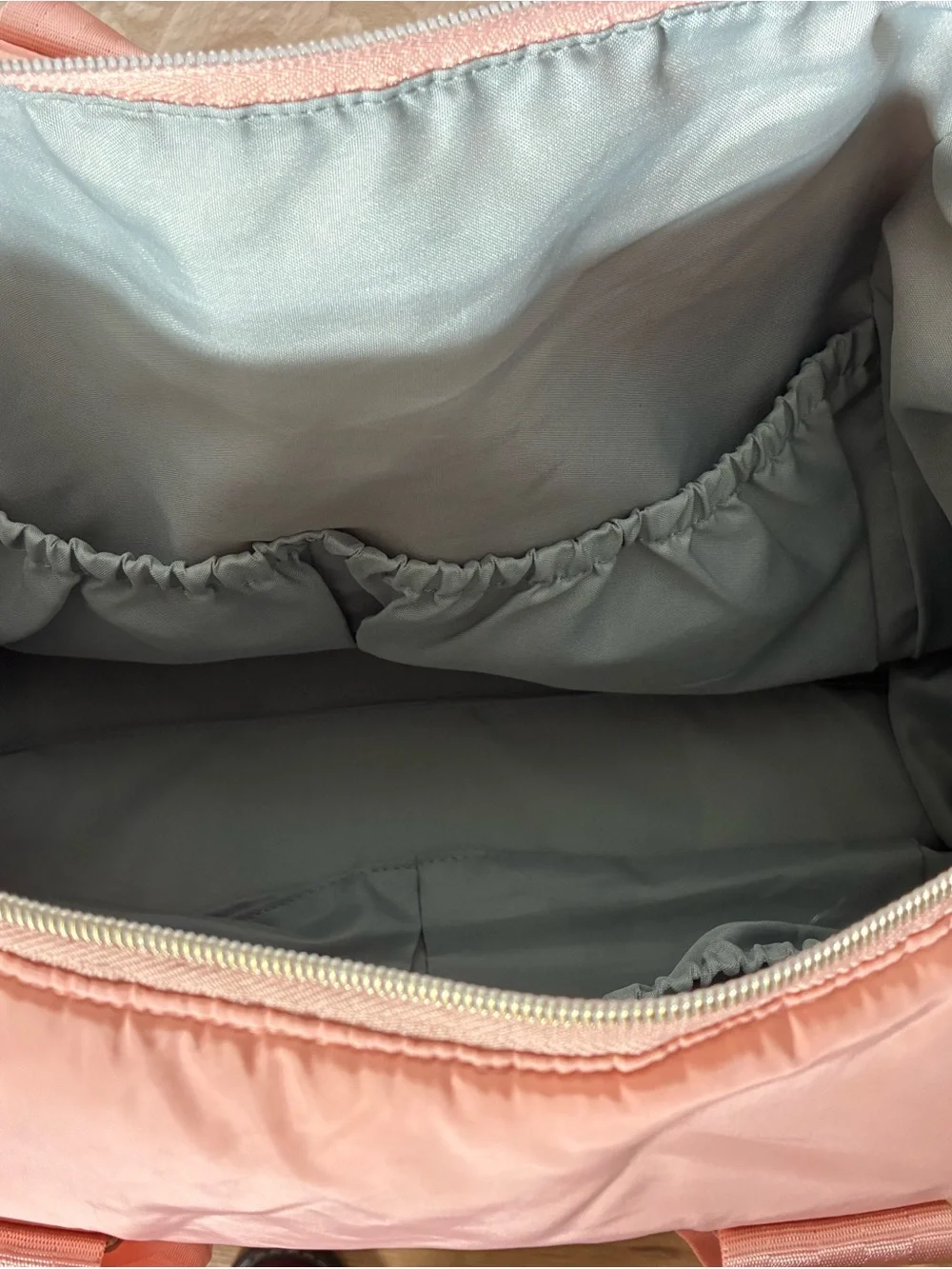 Skip Hop Suite 6-In-1 Diaper Bag in blush pink with quilted details. EUC